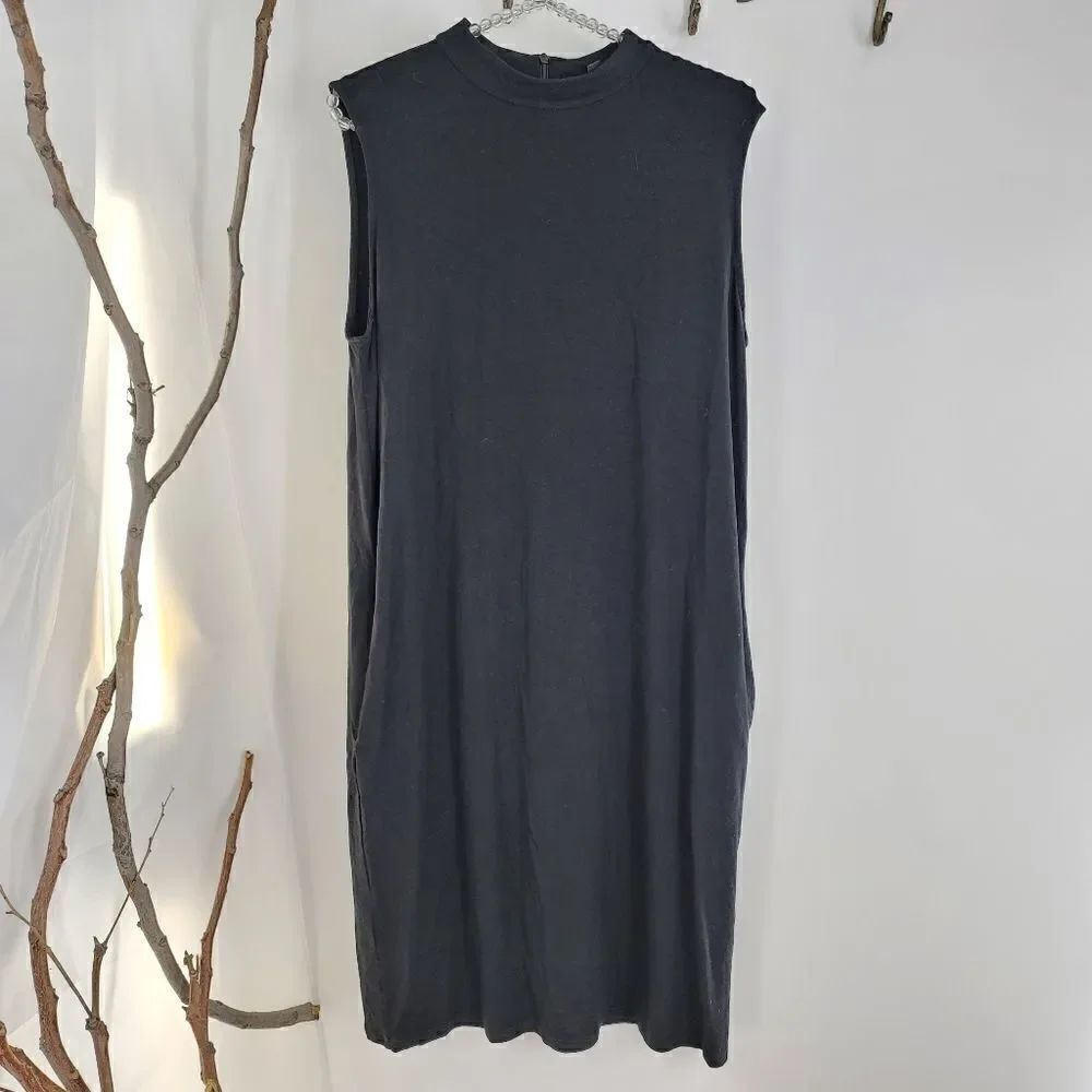 Eileen fisher black sleeveless dress with pockets.